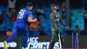 AP/Ricardo Mazalan : Naveen-ul-Haq dismisses Taskin Ahmed during the Afghanistan vs Bangladesh, ICC T20 World Cup 2024 match in Saint Vincent on Tuesday (June 25).