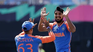AP Photo/Adam Hunger : India's Arshdeep Singh, right, celebrates with teammate Suryakumar Yadav after the dismissal of United States Shayan Jahangir during the ICC Men's T20 World Cup cricket match between the United States and India at the Nassau County International Cricket Stadium in Westbury, New York.