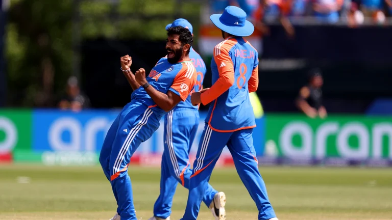 Jasprit Bumrah of India celebrates taking the wicket of Mohammad Rizwan - null