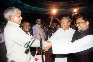 File Photo : One man, many roles: Nitish Kumar with Lalu Yadav and Sushil Modi