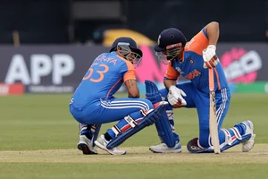  (AP Photo/Adam Hunger) : India's Suryakumar Yadav, left, and Rishabh Pant talk during the ICC Men's T20 World Cup cricket match between United States and India at the Nassau County International Cricket Stadium in Westbury, New York, Wednesday, June 12, 2024.
