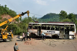 Photos: Yasir Iqbal : The Wreckage: The damaged bus being towed away from the site of the June 9 attack in Reasi