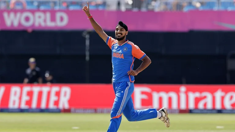 IND Vs USA, T20 World Cup: Indian pacer Arshdeep Singh celebrates a wicket. - AP/Adam Hunger