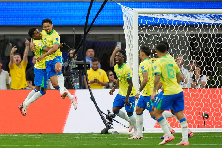 Brazil's Marquinhos, second left, celebrates with teammate Rodrygo a goal that was later disallowed by a VAR decision for offside during a Copa America Group D soccer match against Costa Rica Monday, June 24, 2024 in Inglewood, Calif.  - (AP Photo/Ryan Sun)