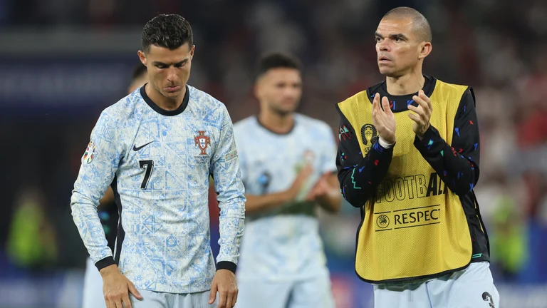 Pepe and Cristiano Ronaldo pictured after Portugal's loss to Georgia - null