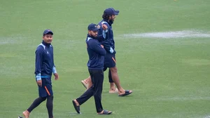 Photo: AP/Lynne Sladky : Nepal players walk around in the wet outfield after rain delays play at their match against Sri Lanka in the ICC T20 World Cup 2024, match 23 in Florida.
