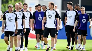 AP : Germany's head coach Julian Nagelsmann, front center, players and staff members walk on the pitch during a training session of the German national soccer team in Herzogenaurach, Germany, Thursday, June 13, 2024