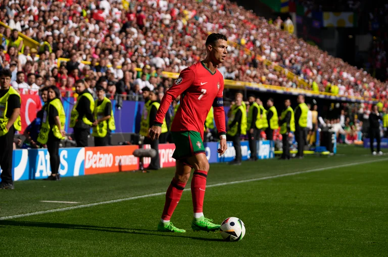 Portugal's Cristiano Ronaldo controls the ball during a Group F match between Turkey and Portugal at the Euro 2024 soccer tournament in Dortmund, Germany, Saturday, June 22, 2024.  - (AP Photo/Themba Hadebe)


