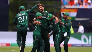 Photo: X/ @T20WorldCup : Pakistan cricket team players celebrating after taking a wicket against India in New York on Sunday.