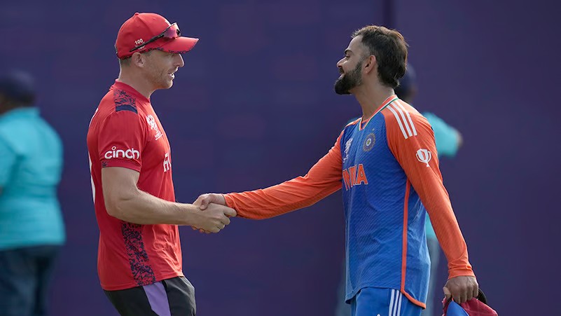 India's Virat Kohli shakes hands with England's captain Jos Buttler after the second semi-final of ICC T20 World Cup 2024 in Guyana. - AP