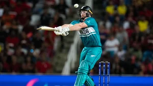 Photo: AP/PTI : New Zealand's Glenn Phillips bats during the men's T20 World Cup cricket match between the West Indies and New Zealand at the Brian Lara Cricket Academy, Tarouba, Trinidad and Tobago.