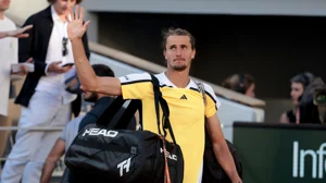 Alexander Zverev waves to the French Open crowd following his defeat to Carlos Alcaraz
