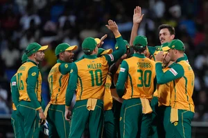 (AP Photo/Lynne Sladky) : South African players celebrate the wicket of West Indies' Shai Hopeduring the ICC Men's T20 World Cup cricket match between the West Indies and South Africa at Sir Vivian Richards Stadium in North Sound, Antigua and Barbuda, Sunday, June 23, 2024. 