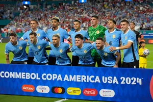 (AP Photo/Marta Lavandier) : Players of Uruguay line up for a team photo before a Copa America Group C soccer match against Panama in Miami Gardens, Fla, Sunday, June 23, 2024. 
