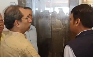 X/@ians_india : Uddhav Thackeray (L) and Devendra Fadnavis waiting together for a lift. 