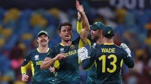 Marcus Stoinis celebrates with team-mates after dismissing Aqib Ilyas