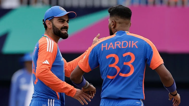 Virat Kohli and Hardik Pandya. - AP/Adam Hunger