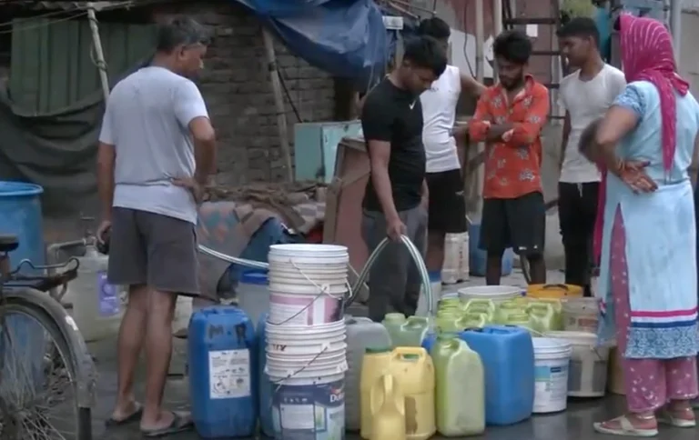 Residents Queue For Water Tankers In Delhi |  - ANI Screengrab