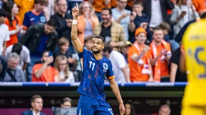 Cody Gakpo celebrates after scoring against Romania