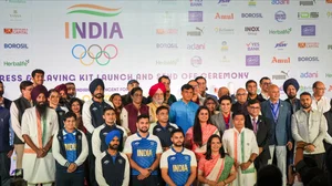 PTI/Arun Sharma : New Delhi: Union Minister of Youth Affairs and Sports Mansukh Mandaviya, Union Minister of Petroleum and Natural Gas Hardeep Singh Puri and IOA Chief PT Usha with athletes during the launch of the ceremonial dress and playing kit for the upcoming Paris Olympics, in New Delhi, Sunday, June 30, 2024.