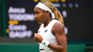 Coco Gauff celebrates during her round two win