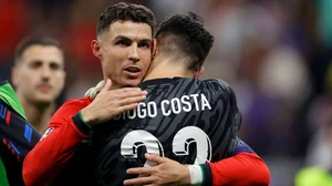 Ronaldo and Diogo Costa embrace after Portugal's win
