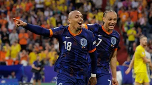 Donyell Malen and Xavi Simons celebrate for the Netherlands on Tuesday