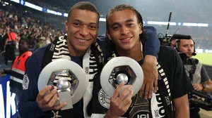 Ethan Mbappe poses with brother Kylian following Paris Saint-Germain's Ligue 1 title win
