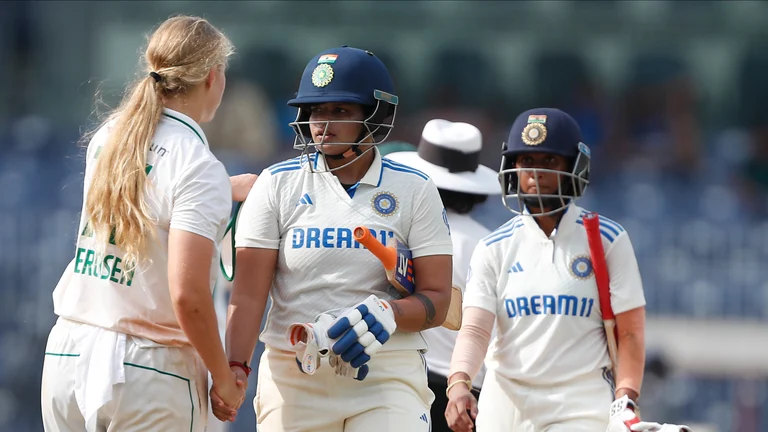 Double-centurion Shafali Verma and Subha Satheesh shaking hands with the South African team after a 10-wicket win in the one-off Test match in Chennai. - Photo: X/ @BCCIWomen