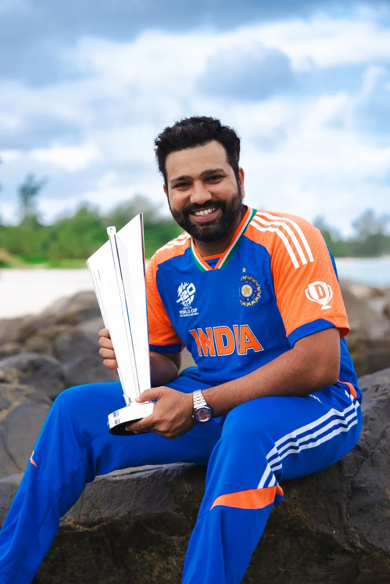 rohit sharma with trophy pic 2 X @BCCI