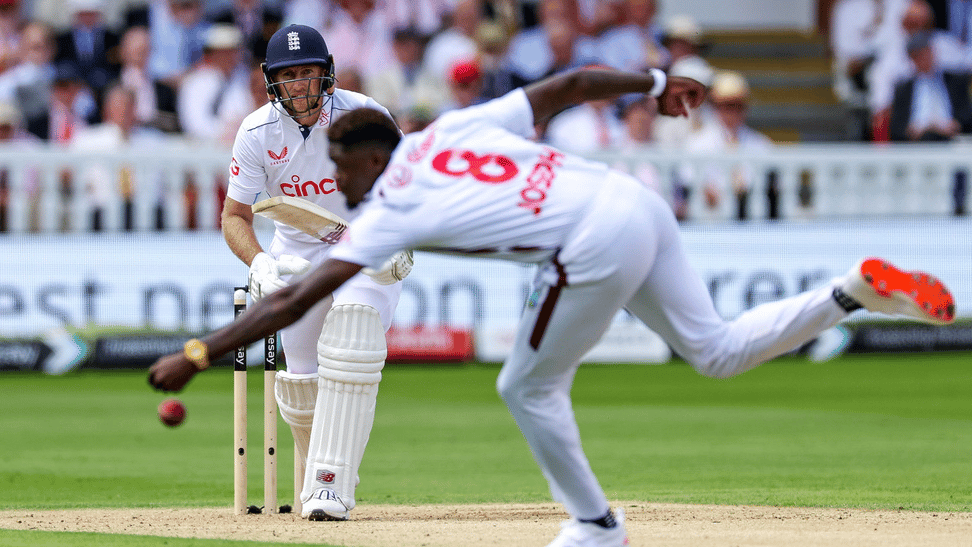 Steven Paston/PA via AP : England's Joe Root bats as West Indies' Shamar Joseph fails to make a catch on day two of the first Test match between England and West Indies at Lord's Cricket Ground, London, Thursday July 11, 2024.