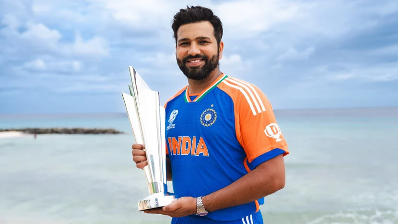 rohit sharma with trophy pic 1 X @BCCI
