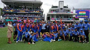 AP/Ramon Espinosa : The joyous Indian cricket team pose with the T20 WC 2024 trophy.