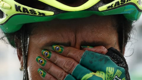 Clemilda Fernandes Silva  got her country Brazil's flag done as her nail art.