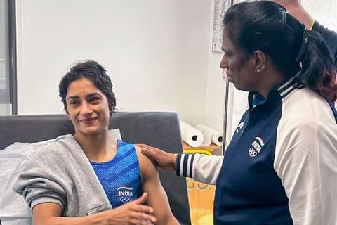 PT Usha meets wrestler Vinesh Phogat