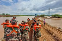 Photo: PTI : Army's disaster relief operation in Vijayawada 