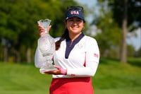 | Photo: AP/Matt York : Solheim Cup Golf, United States vs Europe: United States' Lilia Vu holds the winner's trophy