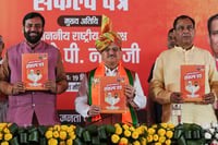 Photo: PTI : BJP's manifesto for Haryana polls released