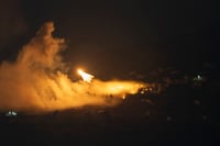 | Photo: AP/Leo Correa : Mideast Tensions: Israeli shelling hit an area in southern Lebanon