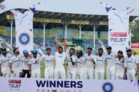 | Photo: AP/Ajit Solanki : IND vs BAN, 2nd Test: Indian players celebrate with the trophy