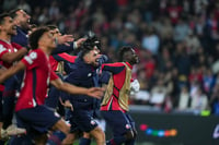 | Photo: AP/Thibault Camus : UCL 2024-25, Lille vs Real Madrid: Lille's players celebrate their team victory