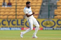 | Photo: AP/Aijaz Rahi : IND Vs NZ 1st Test: India's Mohammad Siraj celebrates the dismissal of New Zealand's Daryl Mitchell