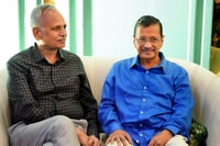 | Photo: PTI : Arvind Kejriwal meets Satyendar Jain