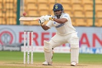 | Photo: AP/Aijaz Rahi : IND Vs NZ 1st Test: India's Sarfaraz Khan hits a boundary 