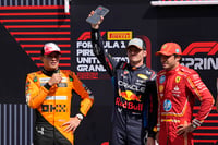 | Photo: AP/Eric Gay : F1 US Grand Prix Auto Racing: Max Verstappen, center, strands with Lando Norris, left, and Carlos Sainz right after winning a sprint race