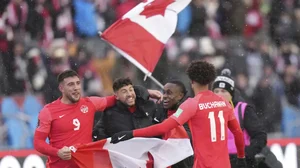Canada players celebrate their win over Jamaica in CONCACAF FIFA World Cup 2022 qualifier.