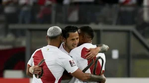Peru's Gianluca Lapadula (centre) celebrates scoring his side's opening goal vs Paraguay on Tuesday.