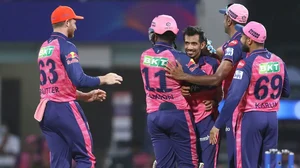 Yuzvendra Chahal celebrates after taking a Mumbai Indians wicket in IPL 2022.