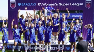 Chelsea players celebrate with the FA Women's Super League trophy on May 8, 2022.