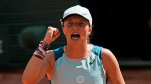 Iga Swiatek reacts after beating Jessica Pegula in French Open 2022 quarterfinals.